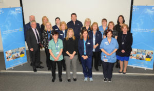 Members of staff receiving their 20 years service awards