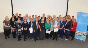 Members of staff receiving their Thirty Years Service