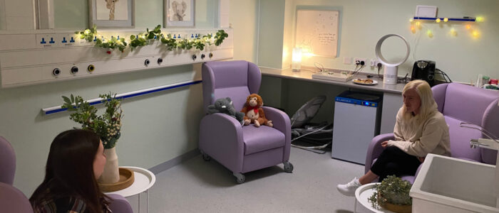 Parents are pictured relaxed in the new Green Room within the Neonatal Unit at Forth Valley Royal Hospital