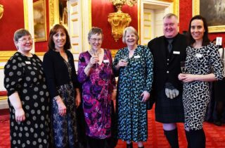 Kay Mair, NHS Forth Valley Parkinson's Nurse Specialist (far left) attends St James’ Palace for royal afternoon tea